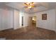 Bedroom with tray ceiling and carpet floors at 2279 Fieldstone Dr, Conyers, GA 30013