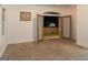 View from bedroom onto patio, with double french doors, outdoor lights, and view of the neighborhood at 2279 Fieldstone Dr, Conyers, GA 30013