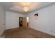 Bedroom with tray ceiling and two doorway entries at 2279 Fieldstone Dr, Conyers, GA 30013