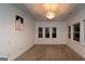 Bedroom with tray ceiling and large windows at 2279 Fieldstone Dr, Conyers, GA 30013
