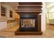 Elegant fireplace with a decorative mantel, creating a cozy and inviting atmosphere at 2279 Fieldstone Dr, Conyers, GA 30013