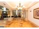 Grand foyer with soaring ceilings, columns, and fireplace, seamlessly blending luxury and comfort at 2279 Fieldstone Dr, Conyers, GA 30013