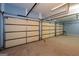 Spacious two-car garage providing ample parking and storage space for vehicles and belongings at 2279 Fieldstone Dr, Conyers, GA 30013