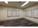 Spacious living room with lots of windows and laminate wood floors at 2279 Fieldstone Dr, Conyers, GA 30013