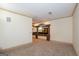 Large living room with a decorative columns and carpet at 2279 Fieldstone Dr, Conyers, GA 30013