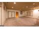 Spacious living room with lots of light and neutral carpet at 2279 Fieldstone Dr, Conyers, GA 30013