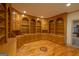 Office with wooden floors, wall-to-wall bookshelf and cabinet at 2279 Fieldstone Dr, Conyers, GA 30013