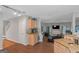 Open kitchen area with granite countertops, stainless steel appliances, and hardwood floors at 1191 Berryhill Dr, Lithonia, GA 30058