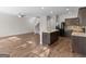 Modern kitchen with granite countertops, stainless steel appliances, and ample cabinet space at 1064 Lear Dr, Locust Grove, GA 30248
