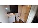 Standard bathroom with single vanity, mirror, toilet, and a shower-tub combo at 4812 White Oak Path, Stone Mountain, GA 30088