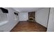 The living room features a stone fireplace and windows that provide natural light at 4812 White Oak Path, Stone Mountain, GA 30088