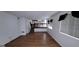 A spacious living room showcases hardwood floors, neutral walls, and stairs leading to the second floor at 4812 White Oak Path, Stone Mountain, GA 30088