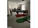 Spacious basement featuring a pool table, dining area, and recreational setup, offering ample entertainment options at 2626 Summit Sw Pkwy, Atlanta, GA 30331