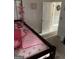 Bright bedroom featuring a pink comforter and star patterned sheets at 2626 Summit Sw Pkwy, Atlanta, GA 30331