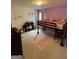 bedroom featuring a bunk bed, playful decor, and a window with natural light at 2626 Summit Sw Pkwy, Atlanta, GA 30331