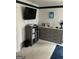 This bedroom contains a grey dresser and a mounted TV on the wall at 2626 Summit Sw Pkwy, Atlanta, GA 30331