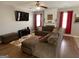 Comfortable living room with plush seating, a fireplace, and a large TV at 2626 Summit Sw Pkwy, Atlanta, GA 30331
