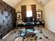 Stylish home office features a statement wall, modern desk, and decorative rug at 101 Elkins Blvd # 53, Locust Grove, GA 30248