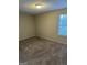 Bedroom with carpet flooring and a window, providing natural light and a comfortable space at 8547 Jamestown Way, Jonesboro, GA 30238