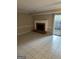 Bright living room with tile floors, a fireplace, and sliding glass doors to the backyard at 8547 Jamestown Way, Jonesboro, GA 30238