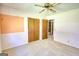 Bedroom view showcasing the closet and the doorway leading to other parts of the home at 1295 Maple St Se, Conyers, GA 30013