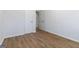 Bright bedroom features wood-look floors, and closet with door at 1894 Evans Evans Sw Dr, Atlanta, GA 30310