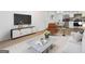 Open-concept design showcasing living room, dining area, and kitchen with stylish furnishings at 1894 Evans Evans Sw Dr, Atlanta, GA 30310