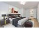 Elegant bedroom with a plush bed, stylish decor, and an en-suite bathroom at 1894 Evans Evans Sw Dr, Atlanta, GA 30310