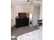 Bedroom featuring carpeted floors and neutral wall color at 7236 Georges Way, Morrow, GA 30260