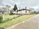 Charming home with traditional architectural details and a cozy backyard at 45 Poplar St, Porterdale, GA 30014