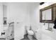 Functional bathroom features shiplap walls, utility sink, and toilet, designed for convenience and practicality at 105 Coogler Way, Brooks, GA 30205