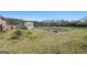 Outdoor garden with raised beds and greenhouse at 105 Coogler Way, Brooks, GA 30205