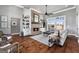 Cozy living room with a brick fireplace, built-in shelving, and comfortable seating at 105 Coogler Way, Brooks, GA 30205