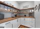 Pantry with custom wood shelving and white cabinets at 105 Coogler Way, Brooks, GA 30205