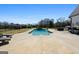 A gorgeous in-ground pool with patio, perfect for hot summer days at 105 Coogler Way, Brooks, GA 30205
