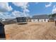Expansive backyard with a trampoline, surrounded by a wooden fence and lush greenery at 243 Summergate Ln, Villa Rica, GA 30180