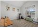 Spacious bedroom with natural light, vaulted ceiling, and carpeted floors at 243 Summergate Ln, Villa Rica, GA 30180