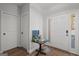 Inviting foyer with hardwood floors, neutral walls, and a decorative accent table at 243 Summergate Ln, Villa Rica, GA 30180