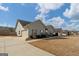 Single-Gathering home featuring a two car garage, well-kept lawn, and a traditional design at 243 Summergate Ln, Villa Rica, GA 30180