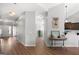 Bright hallway with hardwood floors, connecting various living spaces in the home at 243 Summergate Ln, Villa Rica, GA 30180