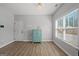This is a spacious living room with hardwood floors and light-colored walls at 243 Summergate Ln, Villa Rica, GA 30180