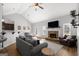 Spacious living room with high ceilings, fireplace, and open layout to the dining area at 243 Summergate Ln, Villa Rica, GA 30180