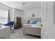 Comfortable bedroom with a neutral color scheme, ample natural light, and plenty of closet space at 85 Clairidge Ln, Lawrenceville, GA 30046