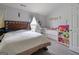 Comfortable bedroom with a bed and a separate play area at 85 Clairidge Ln, Lawrenceville, GA 30046