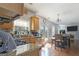 A spacious kitchen features stainless steel appliances, granite countertops, and hardwood floors throughout the open layout at 85 Clairidge Ln, Lawrenceville, GA 30046