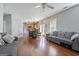 Open-concept living and dining area with hardwood floors and a view of the kitchen at 85 Clairidge Ln, Lawrenceville, GA 30046