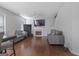 A spacious living room features a fireplace and comfortable seating, perfect for relaxation and entertaining guests at 85 Clairidge Ln, Lawrenceville, GA 30046