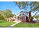 Backyard featuring a deck, covered patio, and a grassy lawn at 1343 Burbank Trl, Morrow, GA 30260