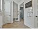 Convenient hallway features built-in bench and storage, and access to outdoors at 415 Discovery Lake Dr, Fayetteville, GA 30215