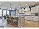 Spacious kitchen features stone countertops, a large island, and stainless appliances at 415 Discovery Lake Dr, Fayetteville, GA 30215